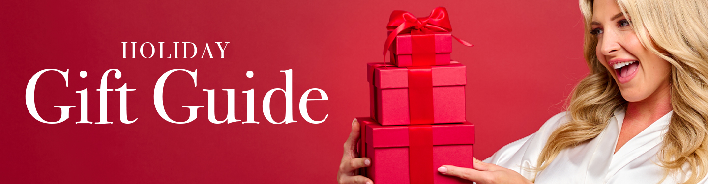 woman holding gift box in red robe