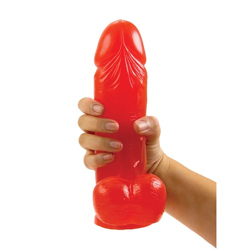 Red 9" Big Boy Dildo With Balls hnd holding for scale
