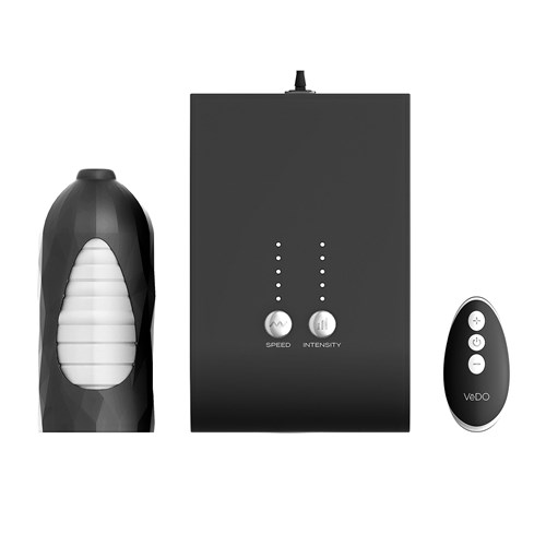 Hummer Hands Free Masturbator pump remote and machine laying on table