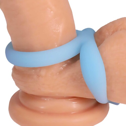 Rock Solid Glow-In-Dark Dual Enhancer Ring close up on dildo