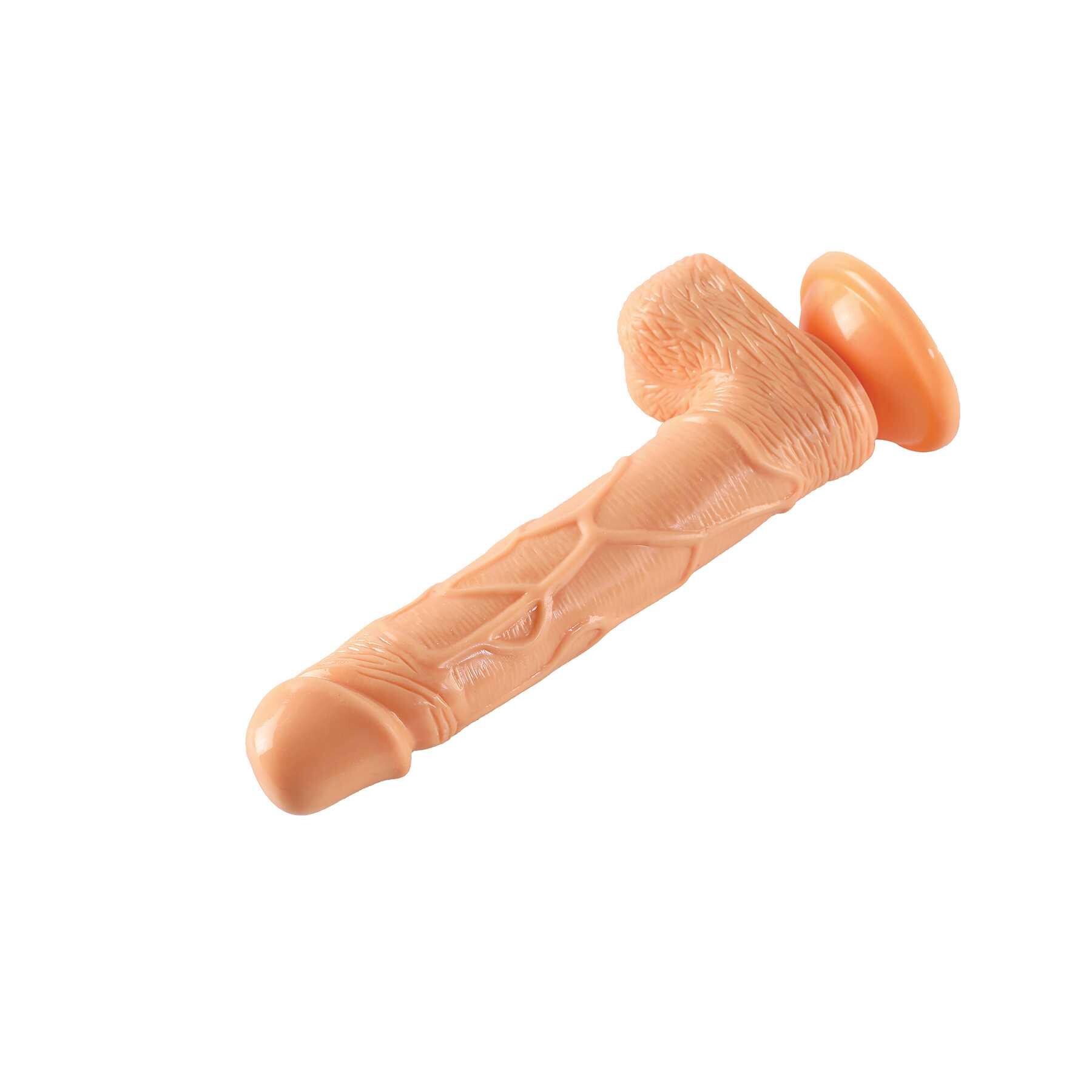 Mr. Long Dildo left facing laying on table