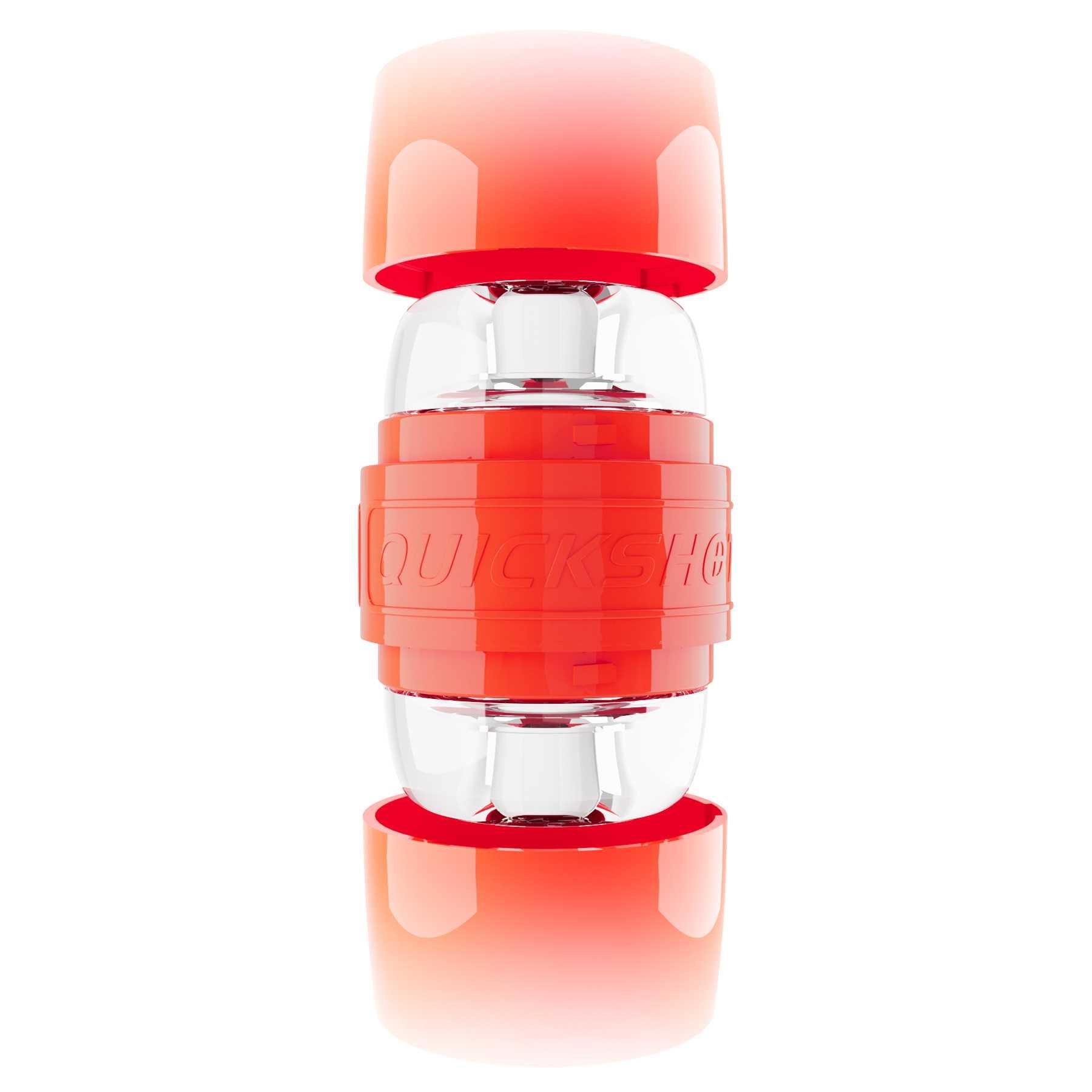 Adam's Quickshot by Fleshlight standing on table with caps on