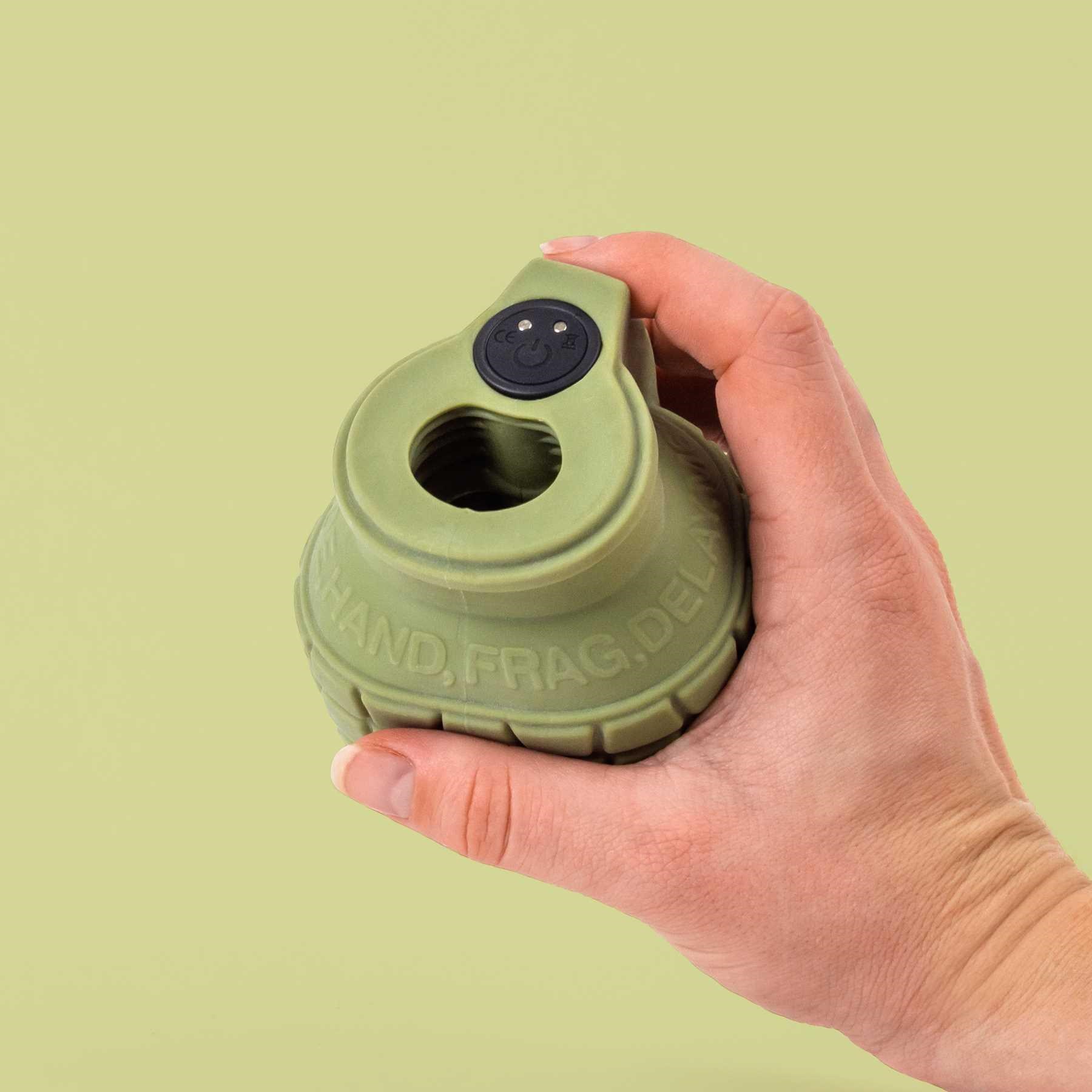 LA BOMBA VIBRATING MASTURBATOR hand holding for scale