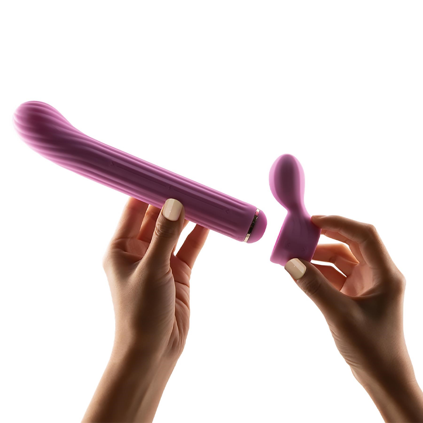 Otouch Magic Stick Interchangeable Vibrator showing how to slide piece on