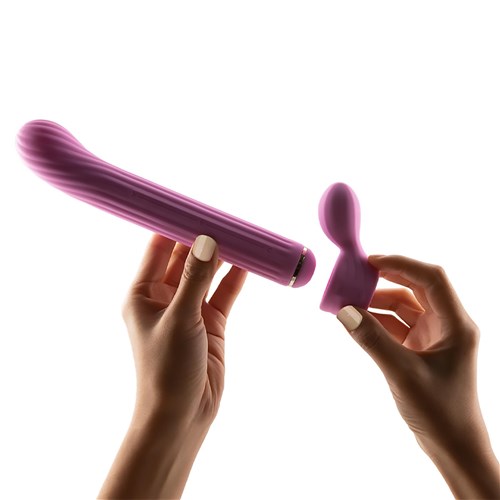 Otouch Magic Stick Interchangeable Vibrator showing how to slide piece on