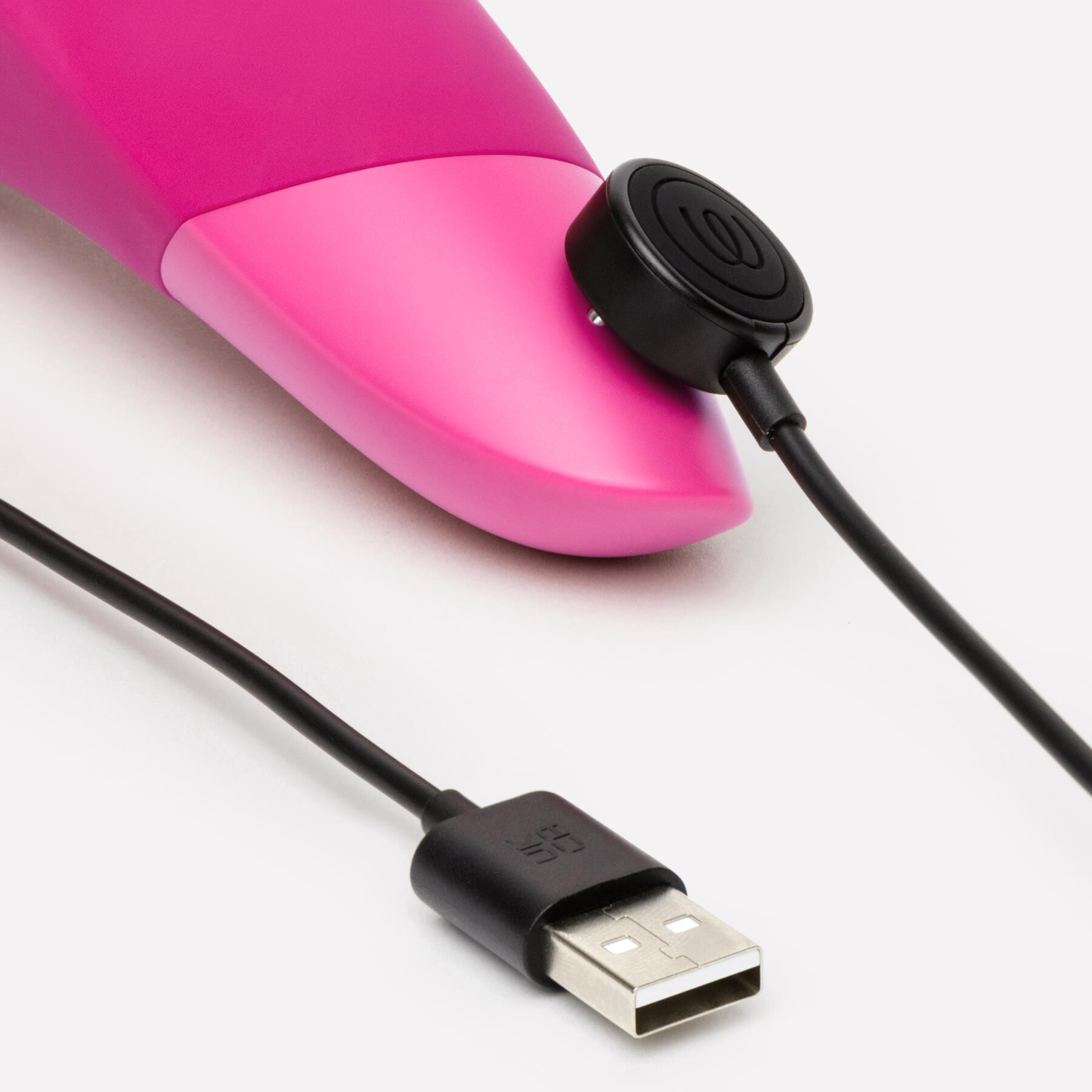 Womanizer Enhance Pleasure Air Clitoral Stimulator pink charger