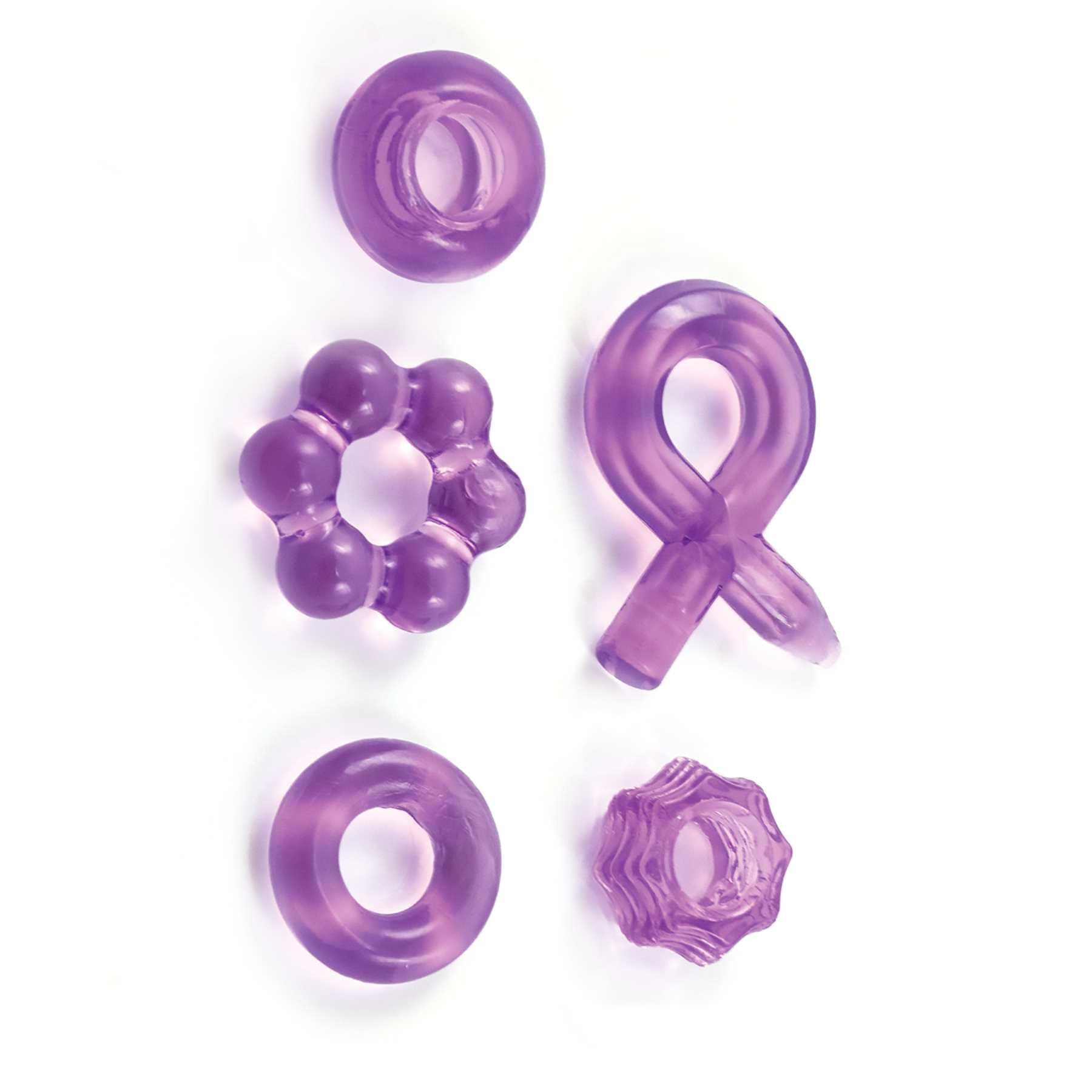 ENHANCER FIVE PIECE COCK RING SET-PURPLE showing all 5 rings