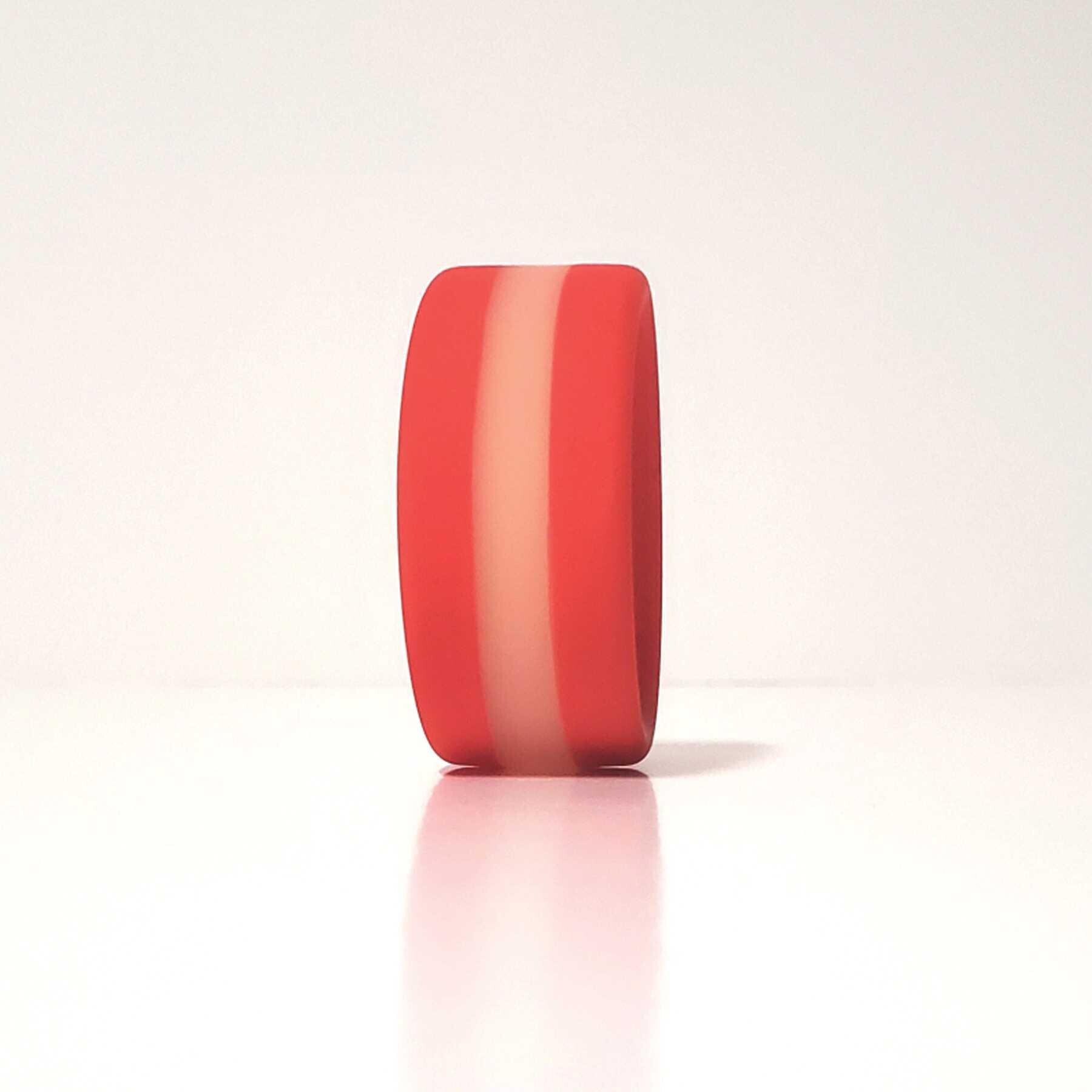 Stripes Glow In the Dark Cock Ring standing upright on table
