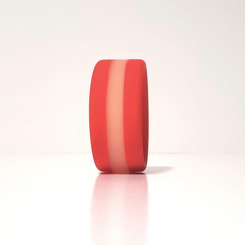 Stripes Glow In the Dark Cock Ring standing upright on table