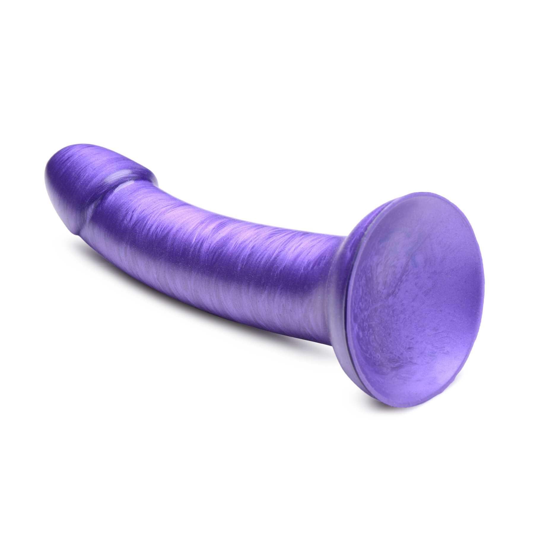 7 Inch Metallic Silicone Dildo purple laying on table