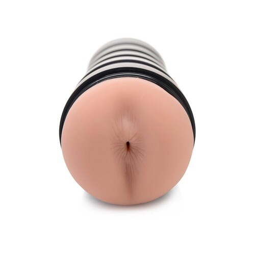 Tia Deluxe Ass Stroker laying on table