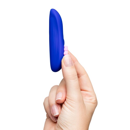 Romp Party Panty Vibrator remote in hand