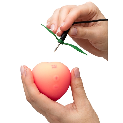 Romp Pink Peach IN HAND WITH STIM OUT