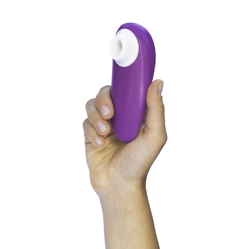 Womanizer Starlet 3 Clitoral Stimulator - color plum in hand