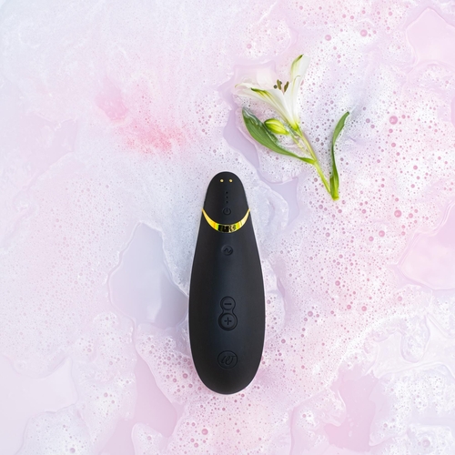 Womanizer Premium 2 Clitoral Stimulator - Black with moody background