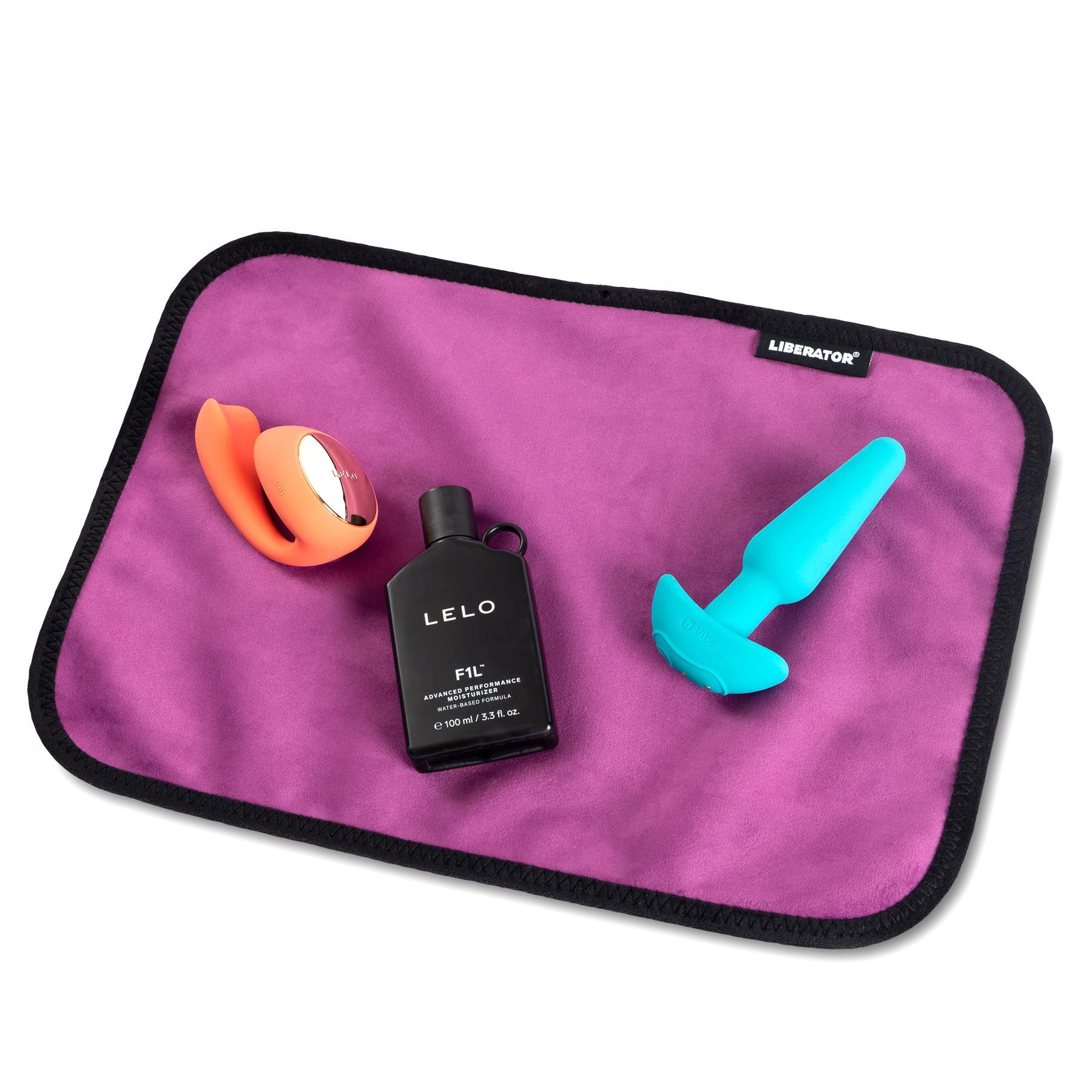 Liberator Fascinator Toy Pad color purple with touys on tje pad