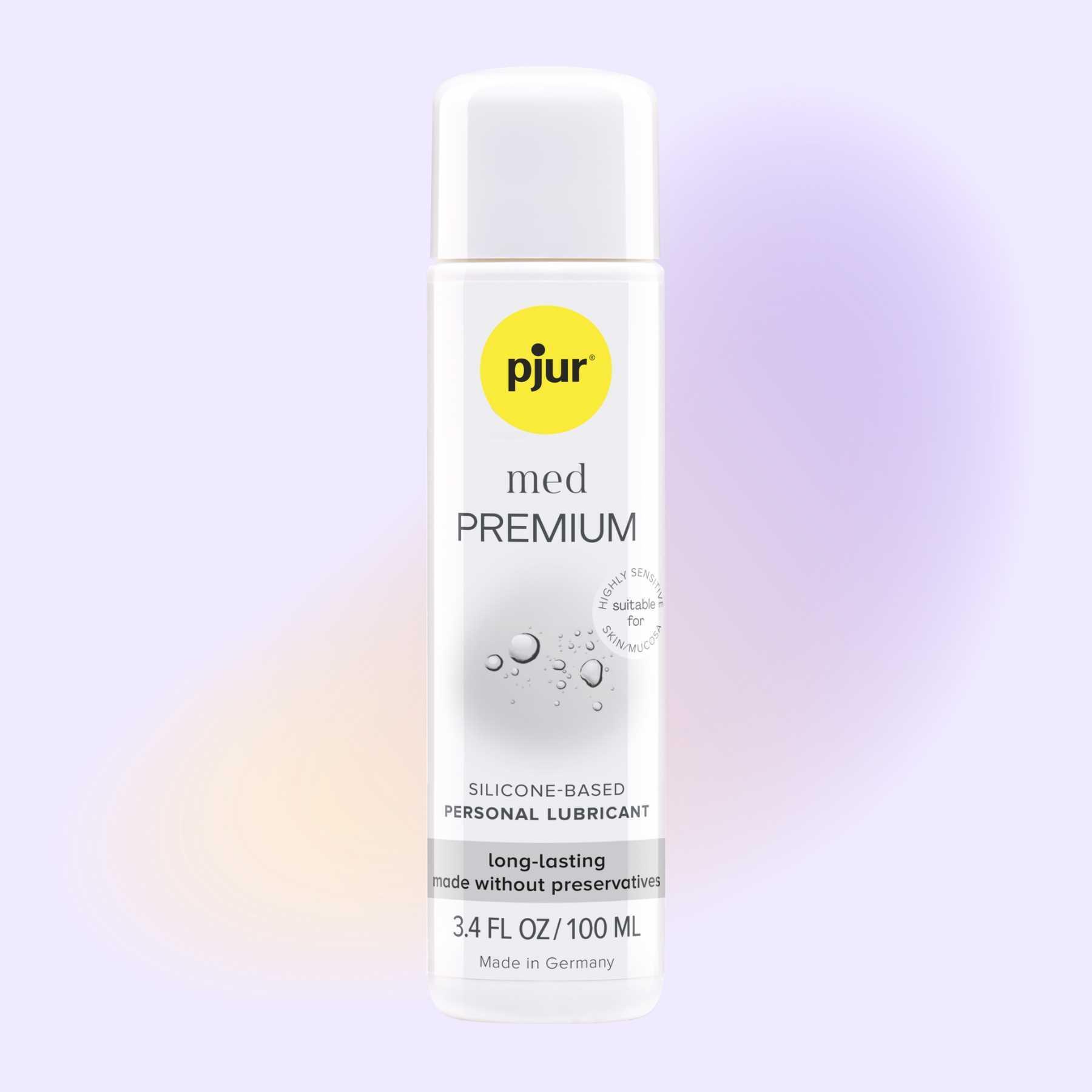 pjur med PREMIUM front of bottle with background color